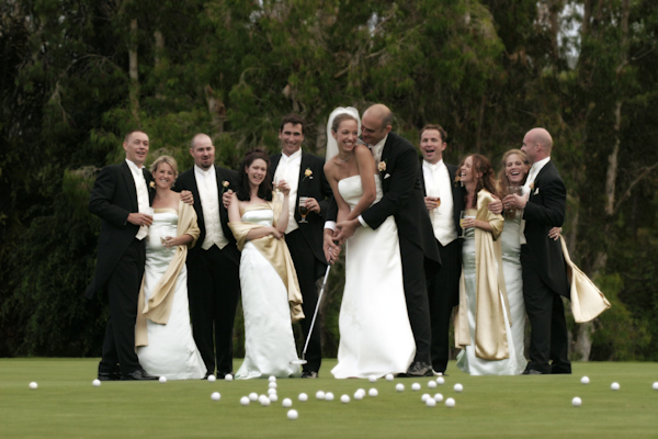 Wedding party having fun on putting green - photo by Jerry Ghionis